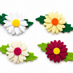 Four felt daisy flowers in all available colours: white, light yellow, ivory and fuchsia, with green leaves and felt centres