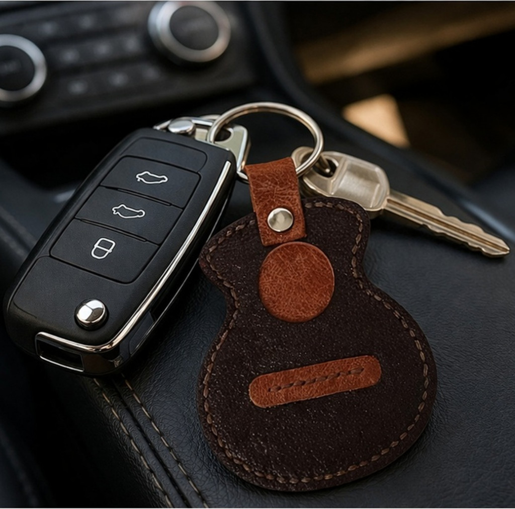 Dark brown handmade leather keyring attached to keys